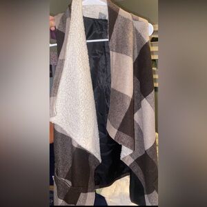 Cute cardigan with pockets. Size small but fits like a medium.